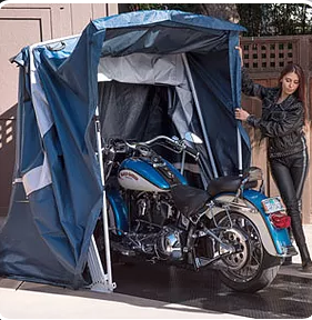 Large touring shelter with motorcycle inside